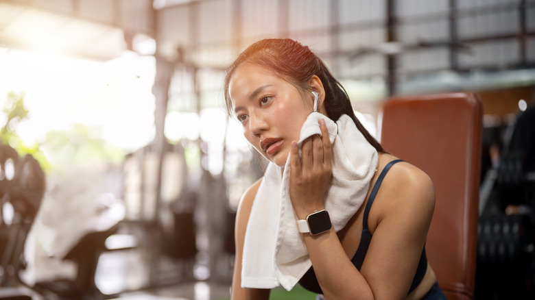 Woman sweating after exercise