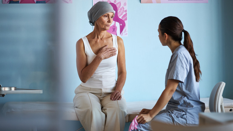 Breast cancer patient talking with a doctor