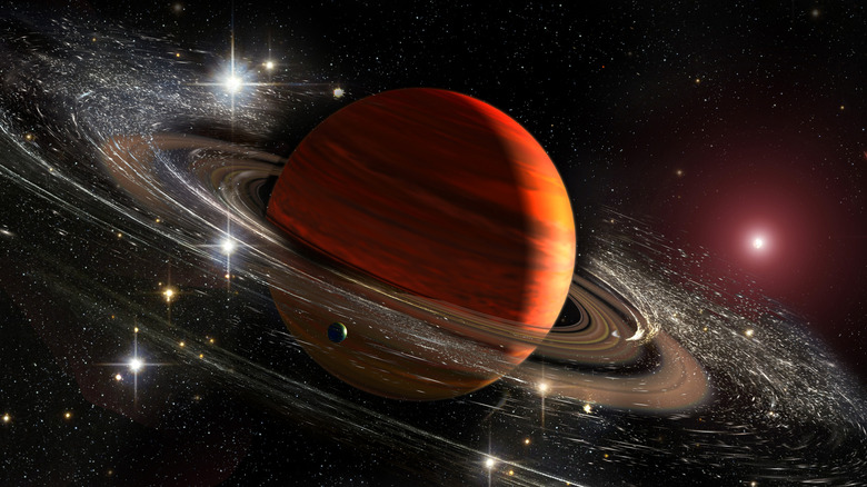 Saturn with rings against bright stars