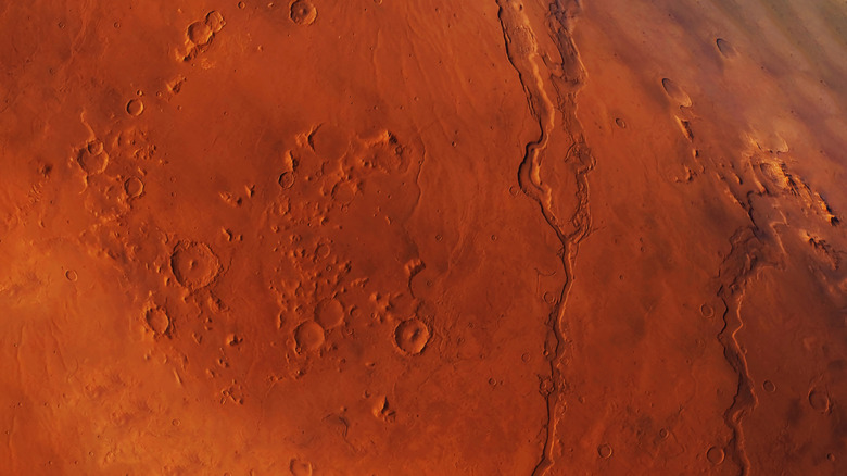 The surface of Mars is red and dusty