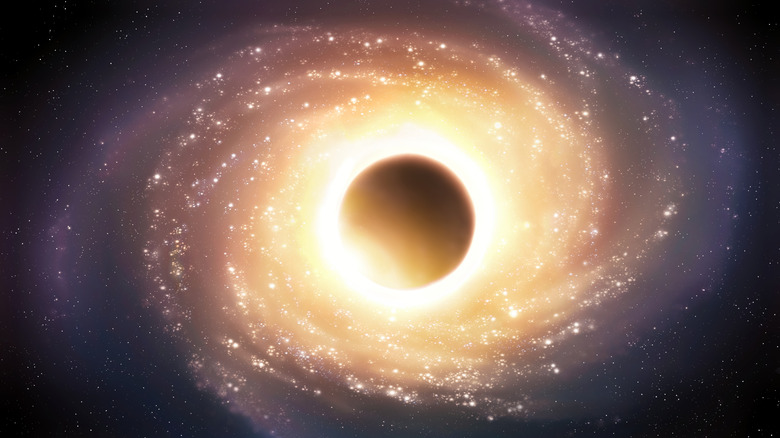 A quasar orbiting a black hole is seen against a black background