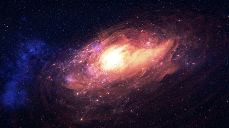 An orange quasar is seen in space