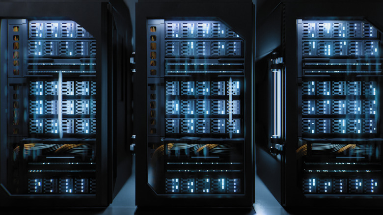 A hallway with rows of supercomputers.