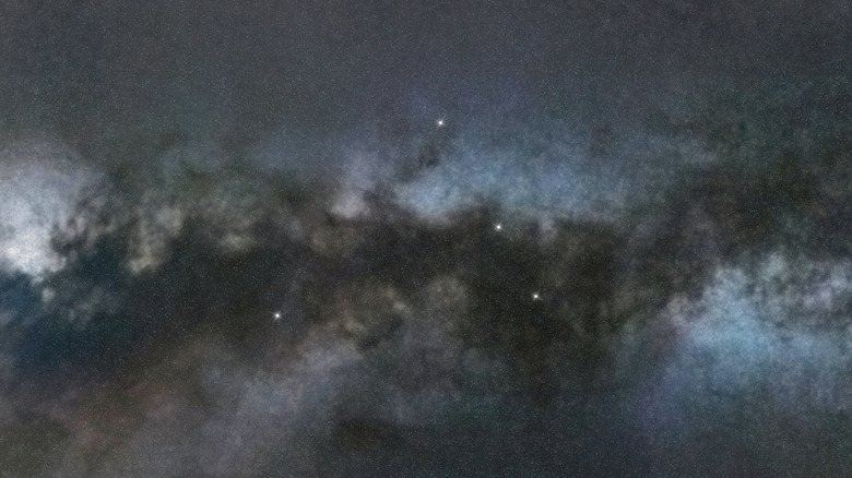 Triangulum Australe constellation in cloudy sky