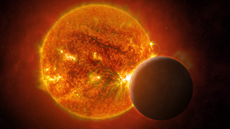 View of the planet Mercury and Sun from space.