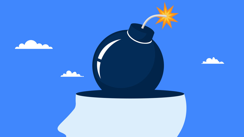Illustration of a bomb dropped into the open skull of a head silhouette