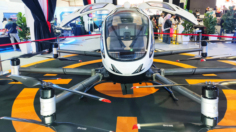 An EHang 216-S, an autonomous electric vertical takeoff and landing (eVTOL) sits on a landing pad