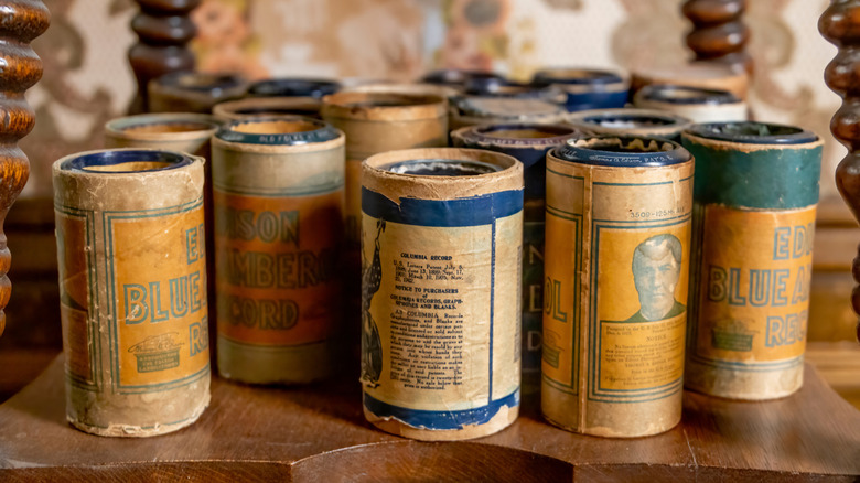 A collection of antique cylinder records