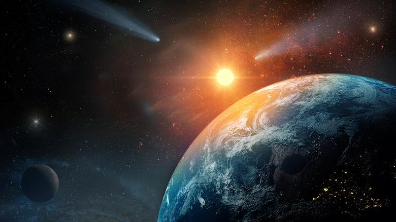 illustration of earth in space with the sun, stars, comets, and moon in the background