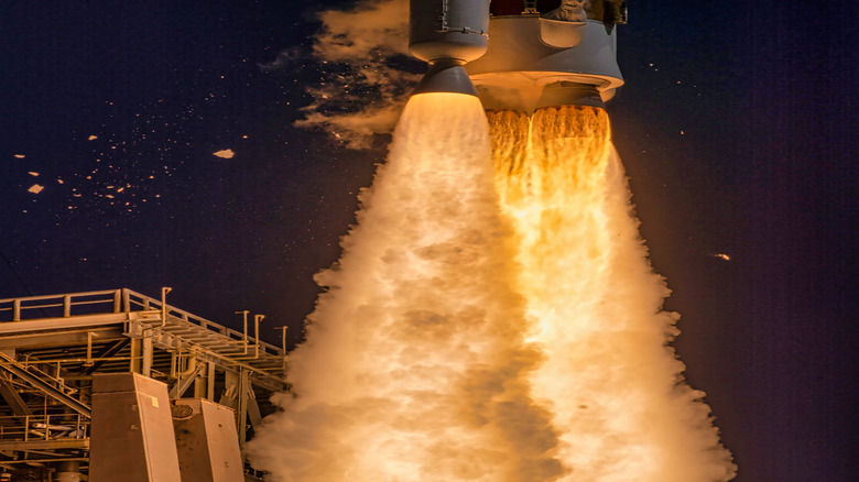 Rocket engine close up during a fiery launch
