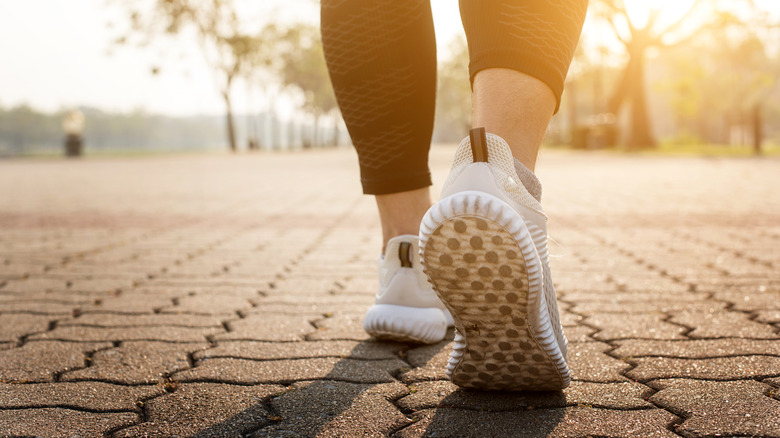 Close-up of a woman's shoes while walking
