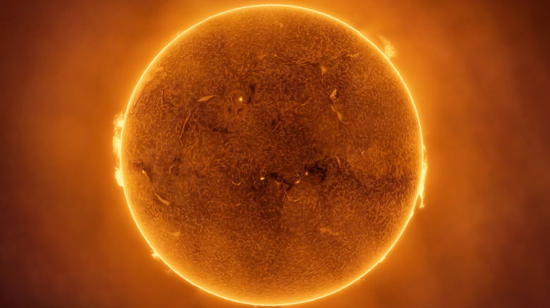 A closeup of the sun shows solar flares on its surface