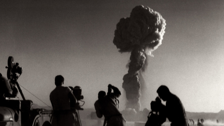 Observers near a nuclear blast in Nevada, 1957.