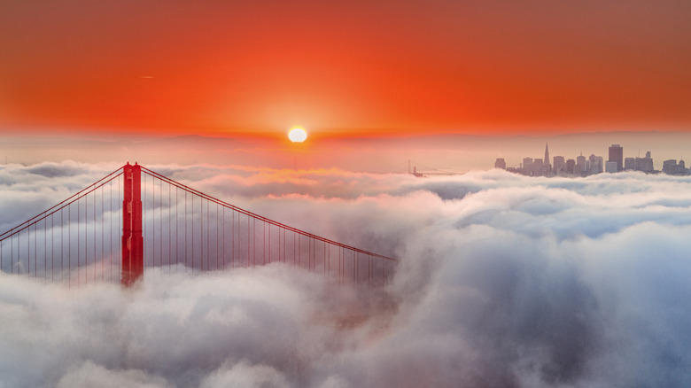 Early morning fog blankets the Golden Gate Bridge in San Francisco