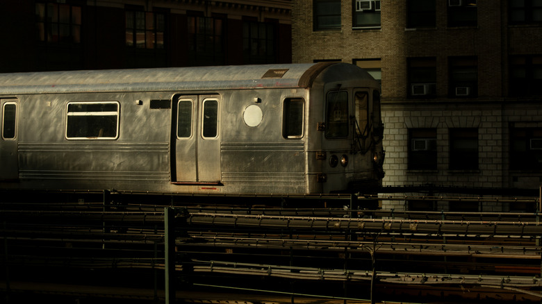 dark NYC elevated subway train