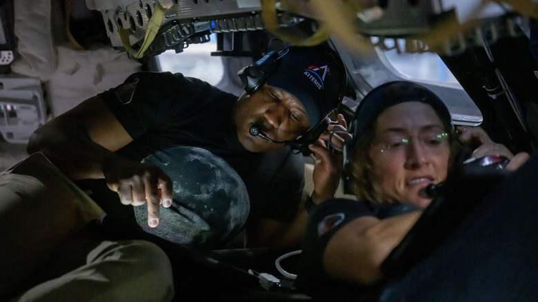 Artemis II crew members, from left, Victor Glover and Christina Koch, participate in crew lunar observations training in the Orion mockup at NASA's Johnson Space Center in Houston.