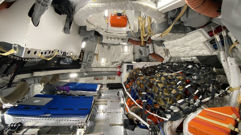 Interior of a mockup of the Orion crew module outfitted in the On-Orbit configuration that will be used in crewed missions.