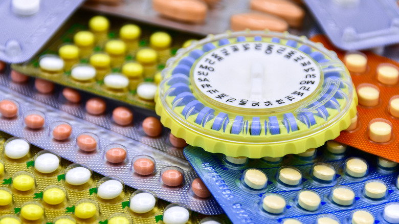 Variety of birth control pills in a pile