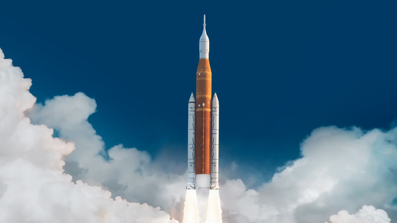 Artemis Space Launch System (SLS) rocket lifting into the sky