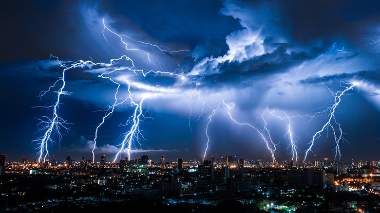 Storm with several bolts of lightning over a city