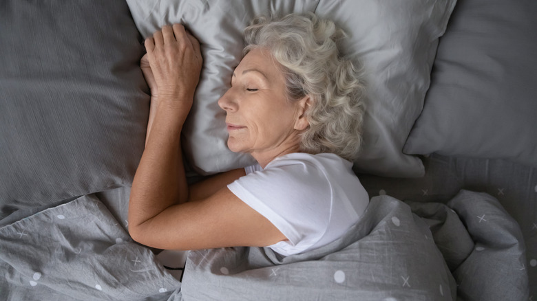 Woman sleeping in bed