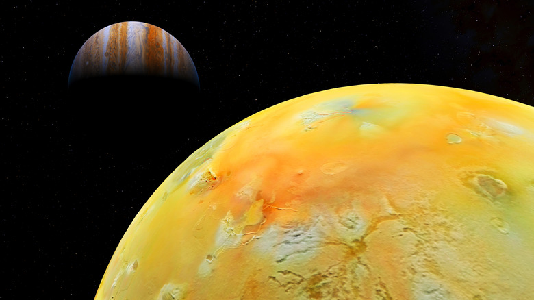 Jupiter's moon Io with Jupiter in the background