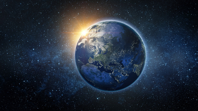 A view from space of sunrise over Earth