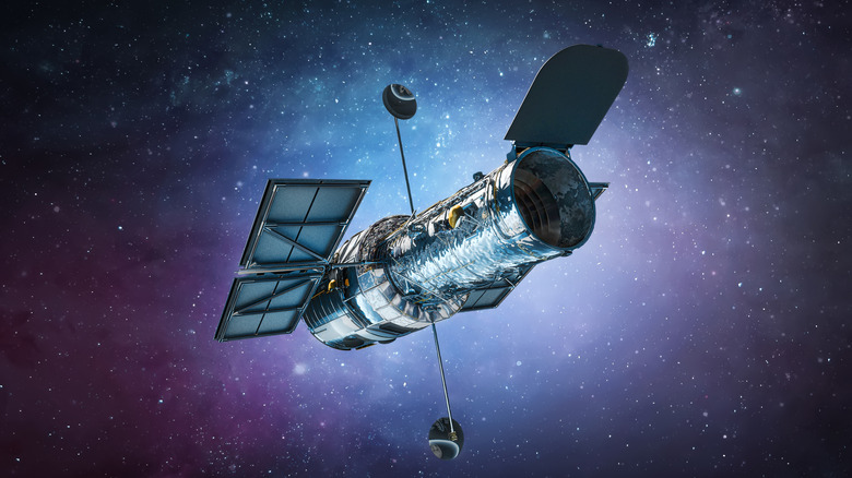 CGI rendering of the Hubble Space Telescope against a colorful starry sky