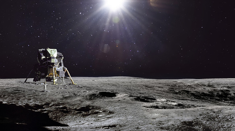 Spacecraft sitting on lunar surface beneath shining star