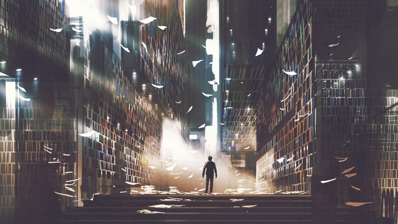 Person standing in a perceived larger building