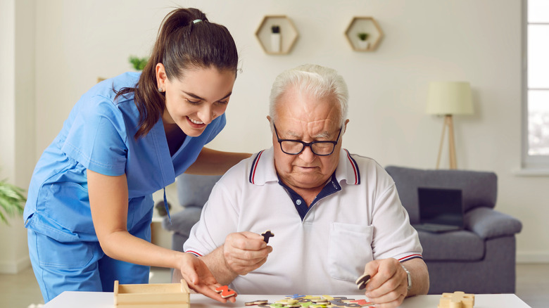 A nurse with an elderly patient