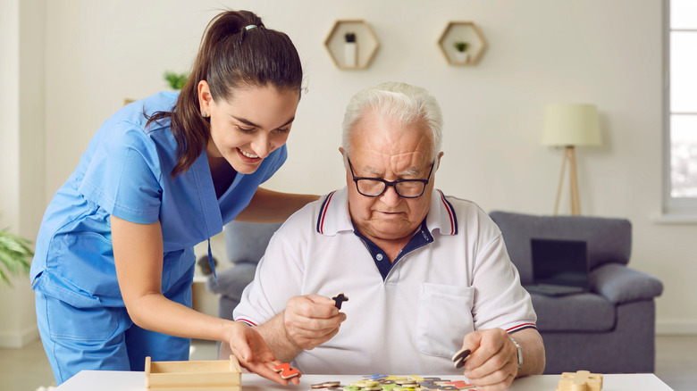 A nurse with an elderly patient