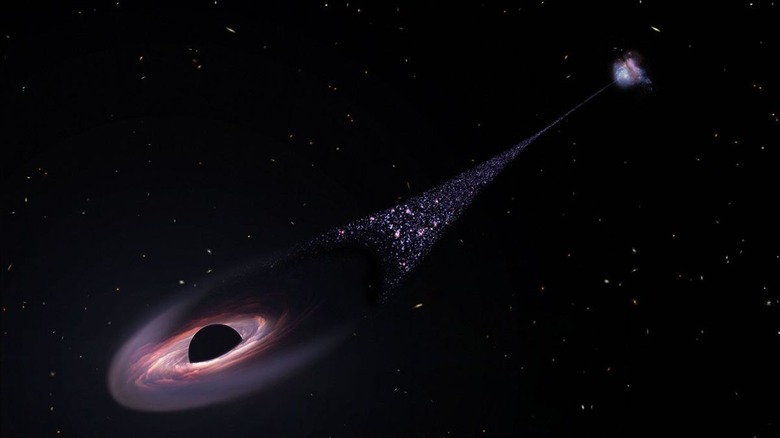 Computer rendering of runaway black hole, trail of stars forming behind it