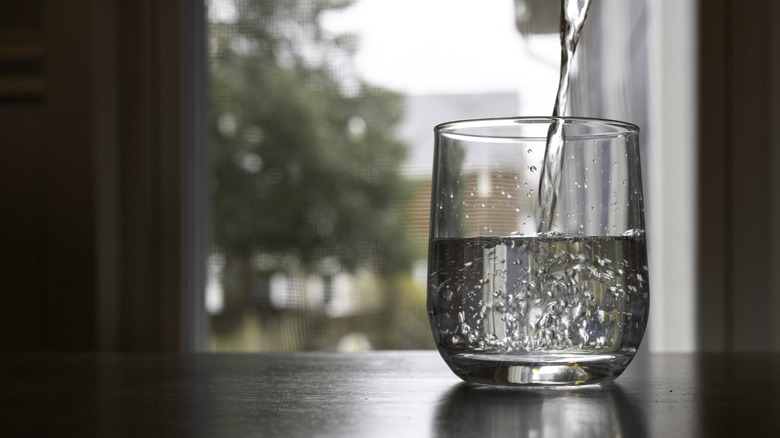 Water being poured into a glass