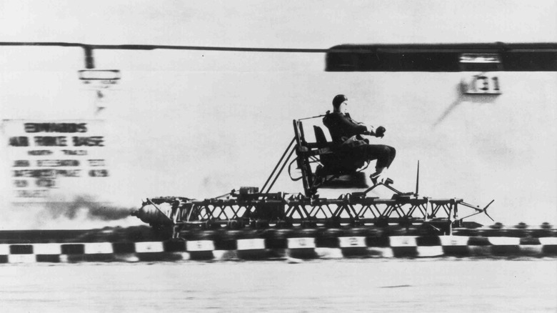 Lt. Col. John Stapp rides a rocket sled at Edwards Air Force Base