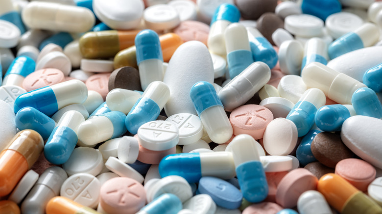 Assorted medication tablets and capsules