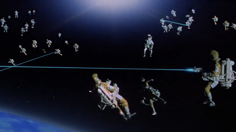 Astronauts fire lasers at one another while suspended in space in Moonraker