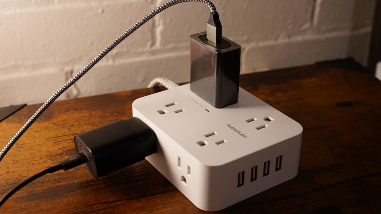 White Multiple outlet Surge Protector Power Strip.