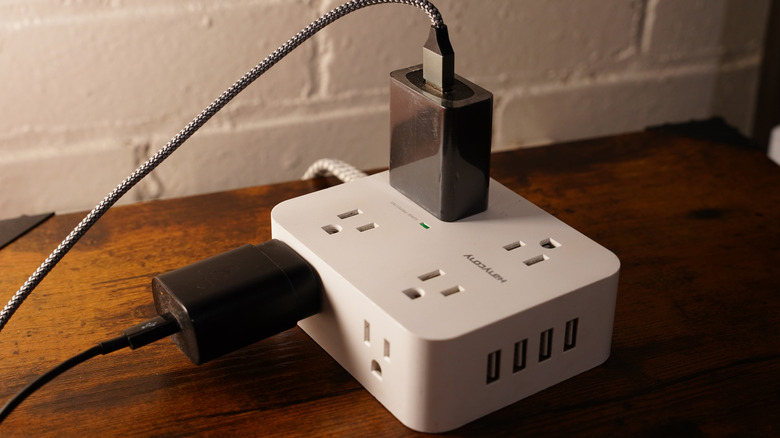 White Multiple outlet Surge Protector Power Strip.