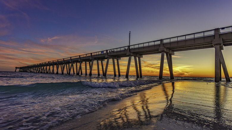 A fishing pier at sunset