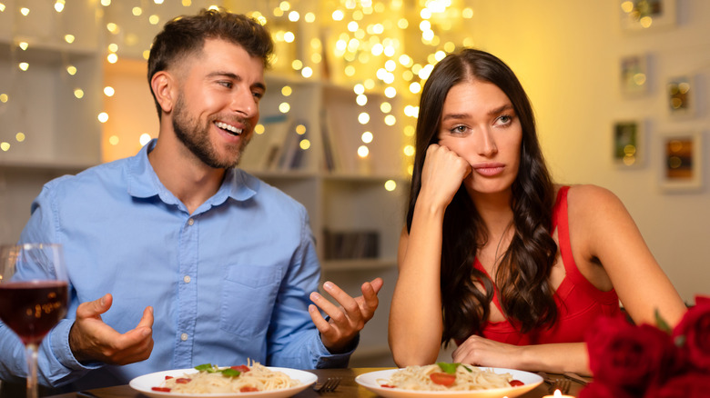 A woman is uninterested in her date