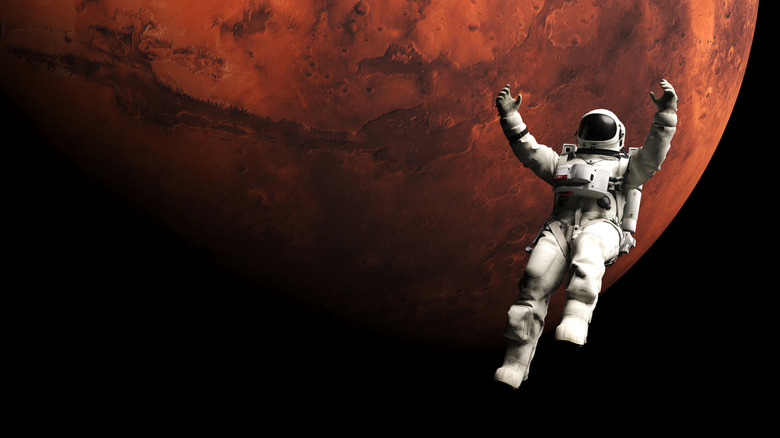 An astronaut is floating in space