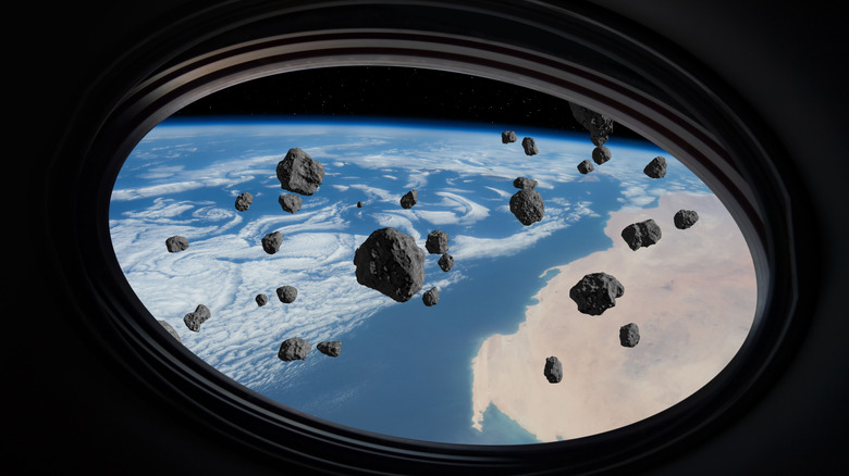 Asteroids as seen through the window of a space station