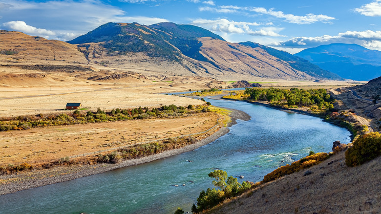 The Missouri River flowing through hills and valleys