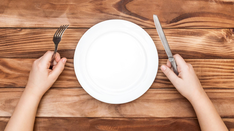 plate on table with no food