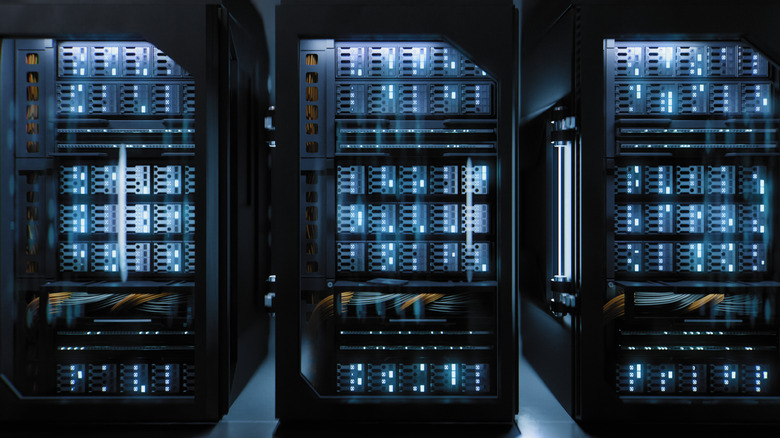 A hallway with rows of supercomputers.