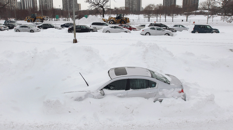 car buried beneath snow in Chicago