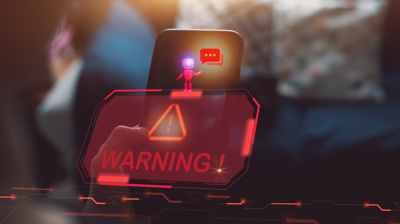 Illustration of an AI bot is standing atop a red warning sign