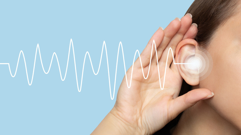 person hearing sound waves