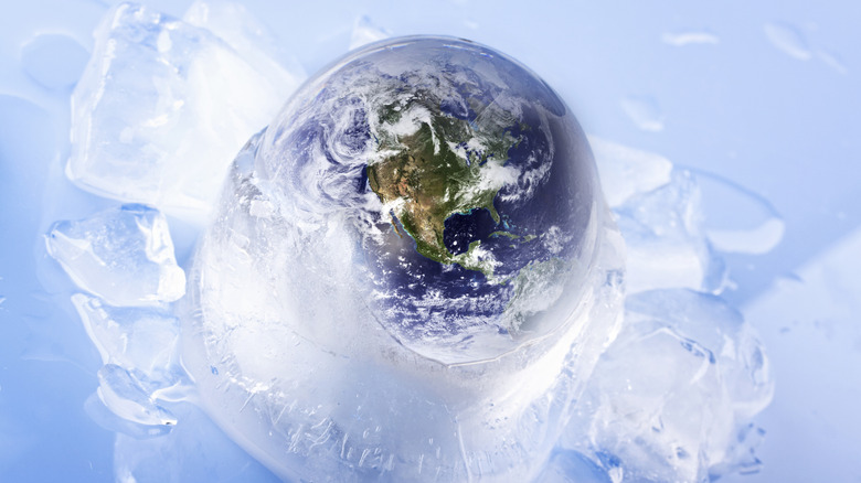 Globe of the Earth frozen in ice